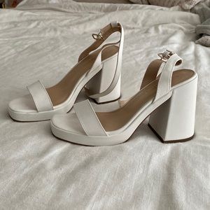 Chunky white ankle strap heels